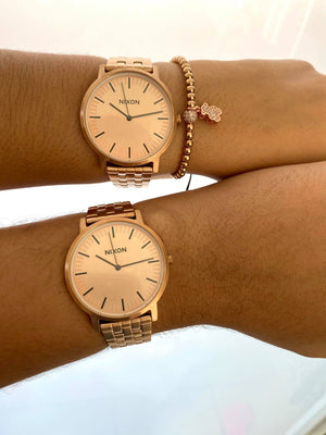 Set Nixon para pareja + Pulsera Gratis