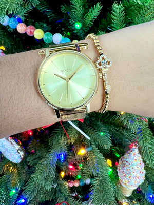 NIXON ORO AMARILLO + PULSERA GRATIS